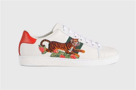 sneaker gucci in pelle nera con tigre ricamata|Gucci Honors Lunar New Year With Tiger Sneakers .